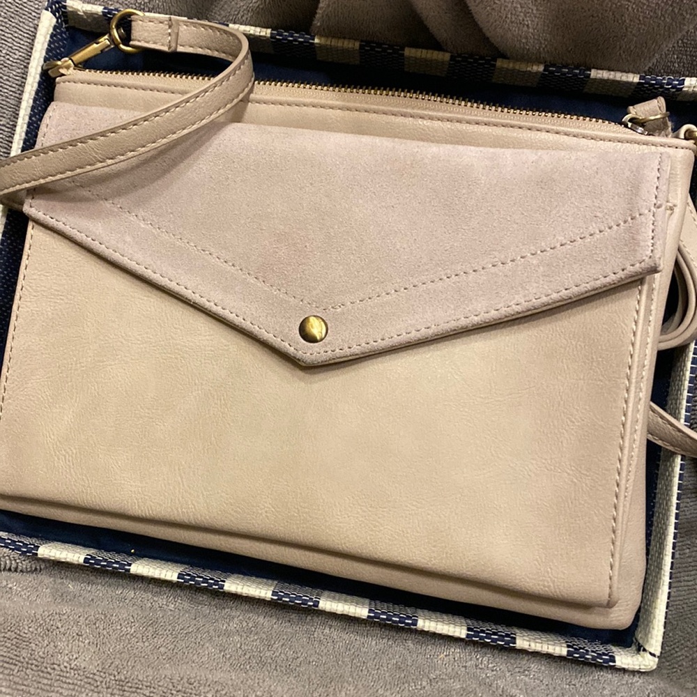 New never use cream purse